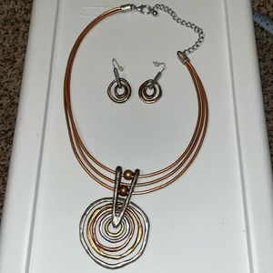 Bronze and silver colored Clay style necklace and matching earrings.